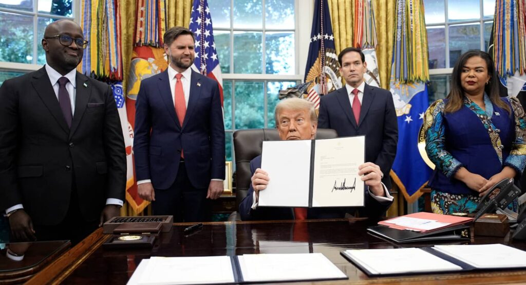 President Donald Trump meets with Congolese Foreign Minister Therese Kayikwamba Wagner (R) and Rwandan Foreign Minister Olivier Nduhungirehe (L), June 27, 2025. Photo credit: Sipa USA via Reuters Connect.