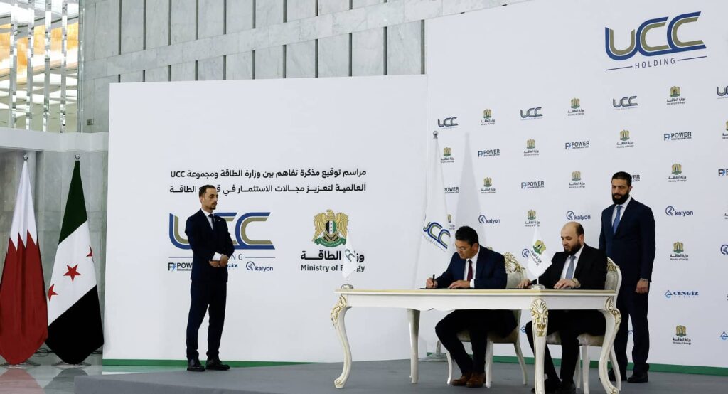 Syrian President Ahmed al-Shara’a attends the signing ceremony of a memorandum between the Ministry of Energy and Qatar's UCC Holding in Damascus, May 2025. Photo credit: REUTERS.