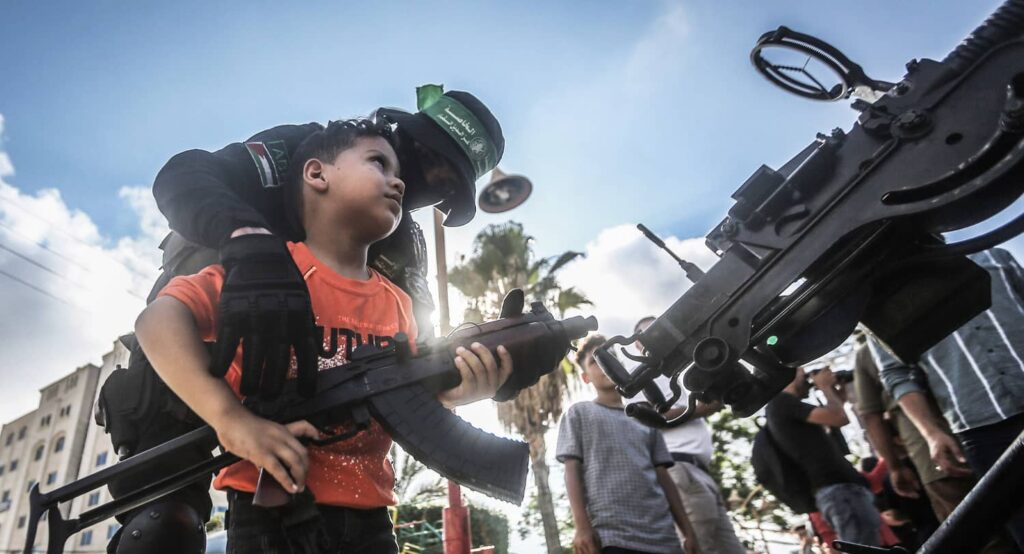 Weapons exhibition for children in Gaza, June 2023. Photo credit: Mohammed Talatene/dpa via Reuters Connect.