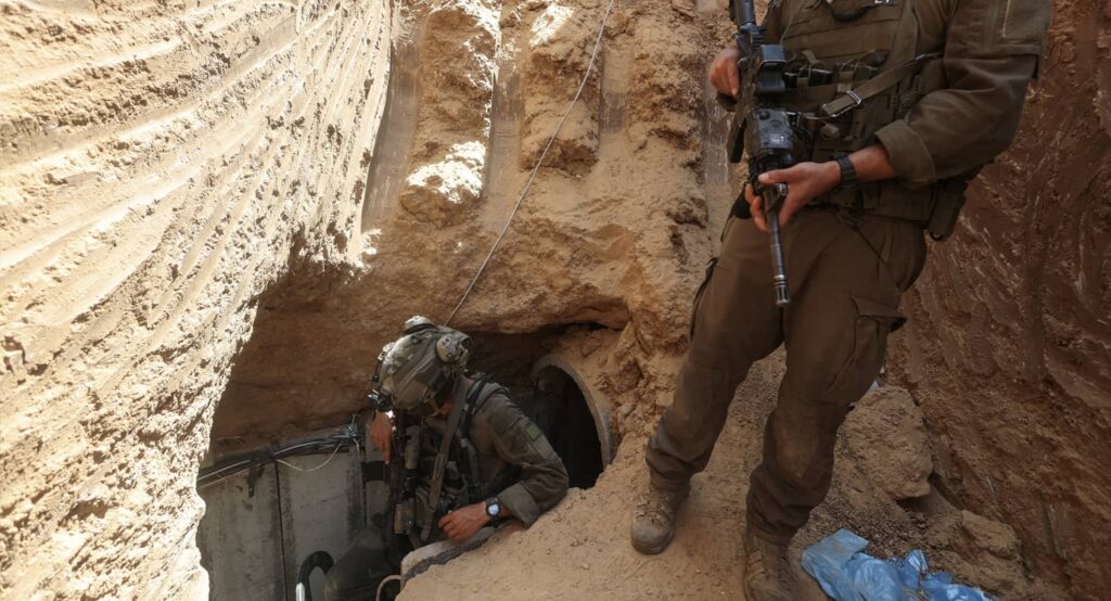 Israeli soldiers walk out from a tunnel underneath the European Hospital in Khan Younis, June 8, 2025. Photo credit: REUTERS/Ronen Zvulun.